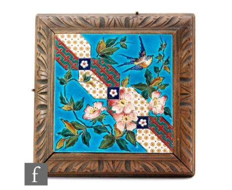 Unknown - A framed 8in waffle back dust pressed tile decorated in the Aesthetic style with a bird in flight amidst dog roses,