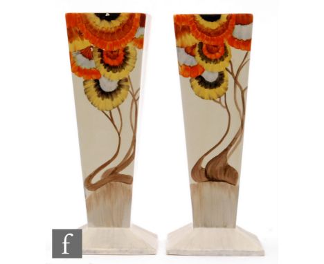 Clarice Cliff - Rhodanthe - A pair of shape 656 square footed vases circa 1934, both hand painted with a stylised tree landsc