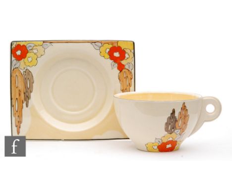 Clarice Cliff - Capri (Orange) - A Biarritz tea cup and saucer circa 1937, hand painted with stylised flowers and foliage, sc