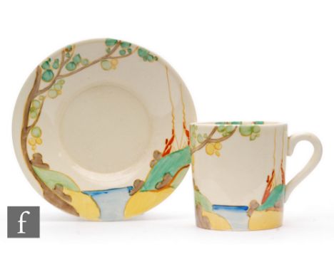 Clarice Cliff - Secrets - A tankard shape coffee can and saucer circa 1937, hand painted with a stylised tree and cottage coa