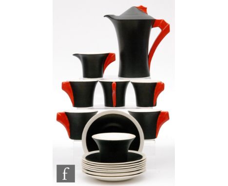 Clarice Cliff - Yoo Hoo - A Daffodil shape coffee set circa 1936, decorated with matt black body and bright red handles, vari