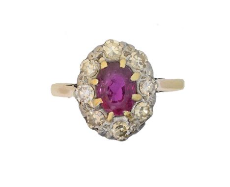 A ruby and diamond ring, A ruby and diamond cluster ring, the oval shape ruby within a single cut diamond surround, stamped 1