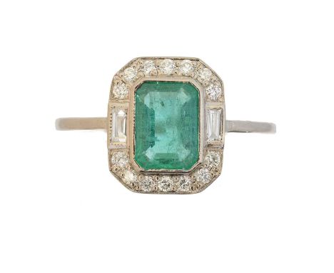 An emerald and diamond cluster ring, An emerald and diamond cluster ring, the rectangular shape emerald within a brilliant an