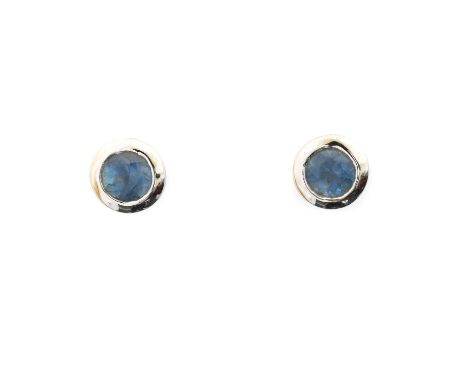 A pair of 18ct gold aquamarine stud earrings, A pair of 18ct gold aquamarine stud earrings, the circular shape aquamarines in