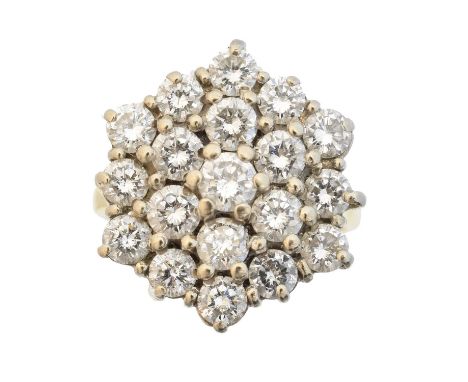 An 18ct gold diamond cluster ring, An 18ct gold diamond cluster ring, the brilliant cut diamond within a similarly cut diamon