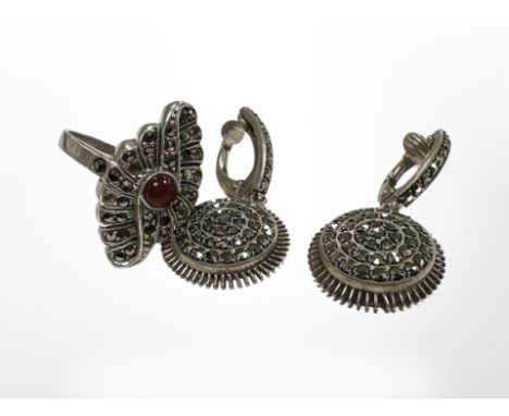 A silver marcasite ring and pair of earrings 