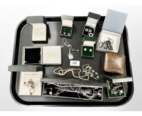 A group of jewellery including a pair of 9ct gold pearl earrings, a silver pendant and earring set, a single-strand cultured 