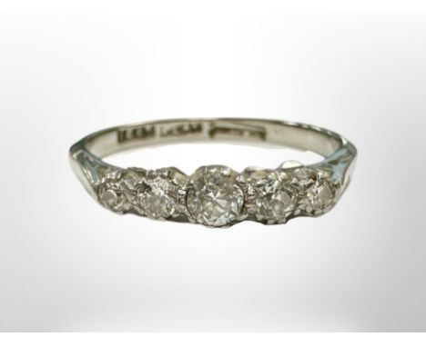 An 18ct white gold and platinum five stone diamond ring, size L. CONDITION REPORT: 2g.