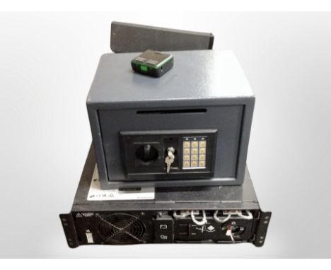 A digital safe with key, together with power supply unit, Rollei part projector in box 