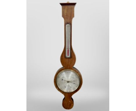 An inlaid mahogany barometer with silvered dial by Perry of Nottingham 
