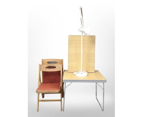 Two folding chairs, two folding tables and an angle poised lamp 