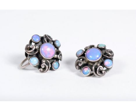 A pair of Arts & Crafts white metal earrings with opal settings, stamped "silver"