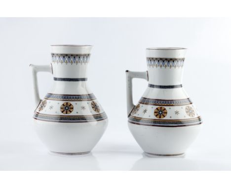 Minton, in the manner of Christopher Dresser pair of aesthetic jugs decorated with geometric patterns on cream ground one wit