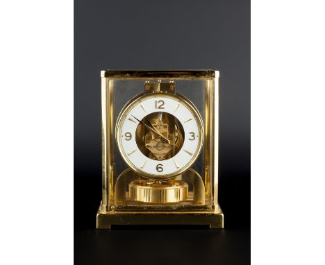 Jaeger-LeCoultre 'Atmos' clock with circular chapter ring set with numerals and gold batons in stepped bracket case signed to