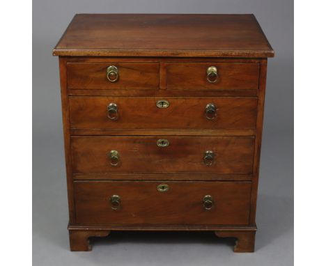 A George III style mahogany small chest, with moulded edge to the overhang top, fitted two short &amp; three long graduated d