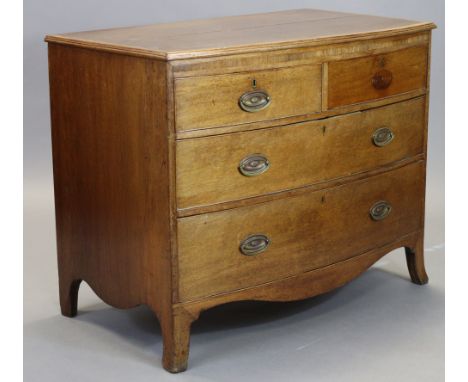 An early 19th century inlaid oak &amp; mahogany bow-front chest, with rosewood crossbanding, fitted two short Y&amp; two long