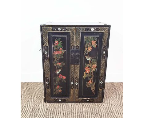 SIDE CABINET, 19th century Japanese black lacquer, and decorated of two doors enclosing a shelf and two drawers, 74cm H x 58c