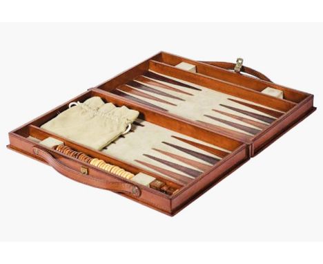 TRAVELLING BACKGAMMON SET, tan leather case, 7cm H x 23cm W x 40cm D. 