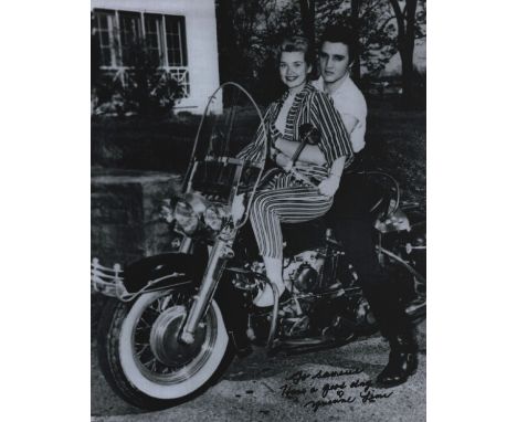 Yvonne Lime signed 10x8 inch black and white photo pictured with Elvis Presley. Dedicated. Good condition. All autographs com