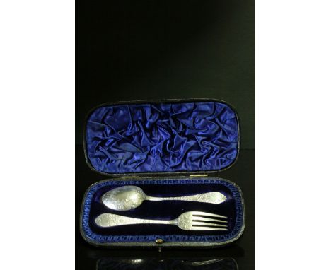A fully hallmarked Victorian sterling silver cased fork &amp; spoon christening set with bright cut decorative engraving, mak
