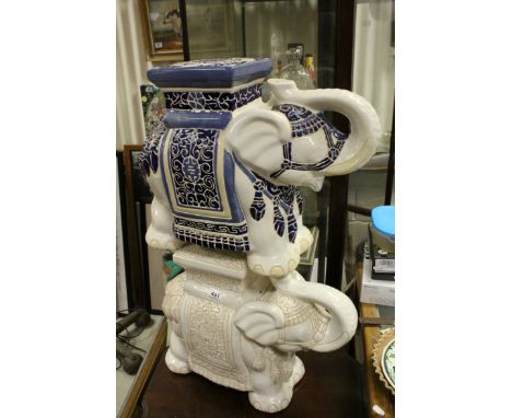 Two Oriental ceramic elephant seats.