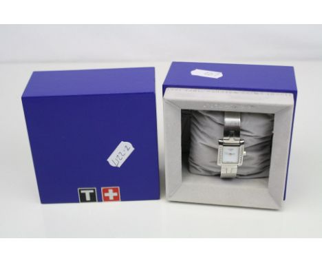 A ladies Tissot watch with diamond set bezel complete with box.