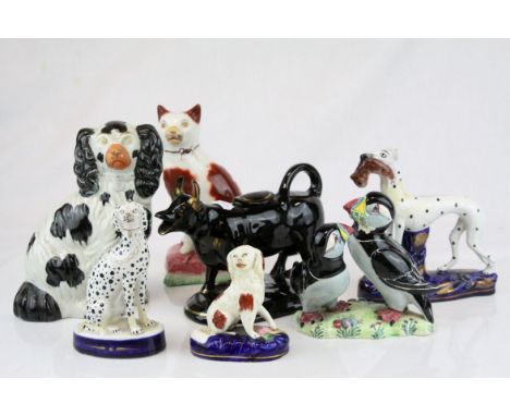 Collection of Ceramics including Four Staffordshire Dogs, Jackfield Black Cow Creamer with Gilt Highlights and Goldscheider (