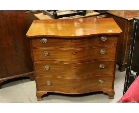 George III Mahogany Serpentine Fronted Chest of Four Long Drawers raised double ogee bracket feet, h.82cms L.92cms