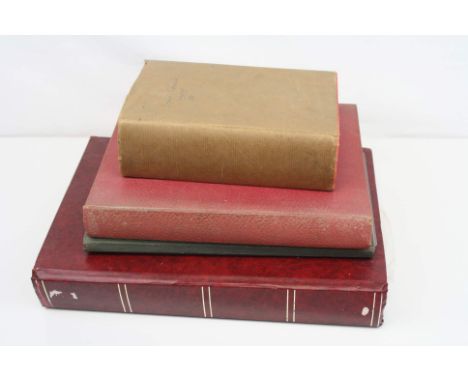 A collection of British and world stamps contained within 3 albums together with a stamp price guide book.