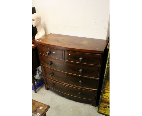 19th century Mahogany Bow Fronted Chest of Two Short over Three Long Drawers raised on splayed feet, with mother of pearl to 