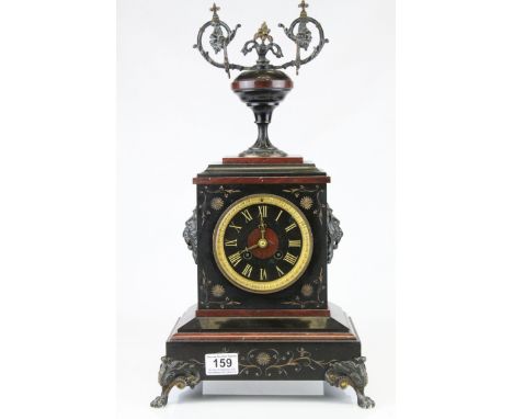 Victorian Slate and Marble Mantle Clock surmounted by an Urn Shaped Finial, raised on Metal Lion Paw Feet, with key, 49cms hi