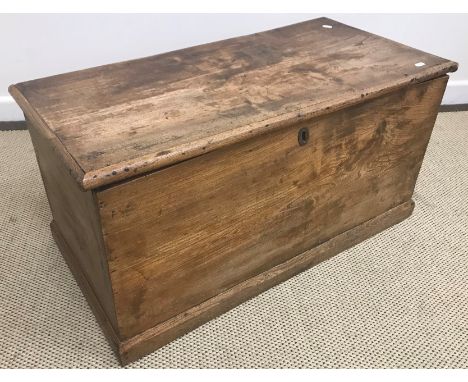 A 19th Century elm trunk, the single piece top over single piece sides on a plinth base 87 cm wide x 43 cm deep x 42.5 cm hig