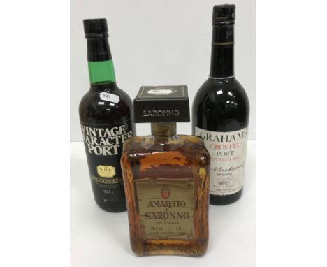 One bottle Graham's Crusted Port bottled 1985, one bottle Wine Society Vintage Character Port and one bottle Amaretto di Saro