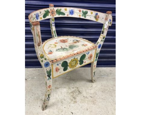 A 19th Century Norwegian folk art floral painted bow back wooden chair on splayed supports decorated throughout with floral s