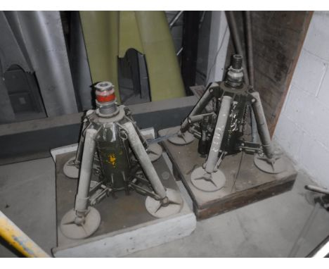 A pair of pneumatic jacks, the heavy duty cylinders on four supporting arms, one stencilled "VAL BNP/IS", two heavy duty manu