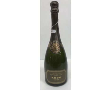 One bottle Krug Champagne Vintage 1979 CONDITION REPORTS Contents of the bottle appear to be fairly clear, there is a little 