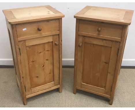 A pair of Victorian pine pot cupboards, the plain tops above a drawer and cupboard door, 41.5 cm wide x 35.5 cm deep x 79.5 c