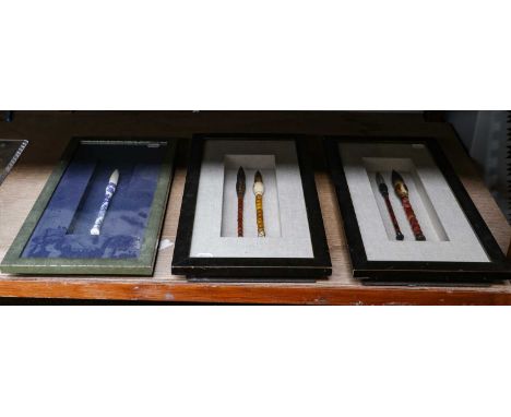 A collection of ten Japanese calligraphy brushes, some framed, together with an African fly whisk