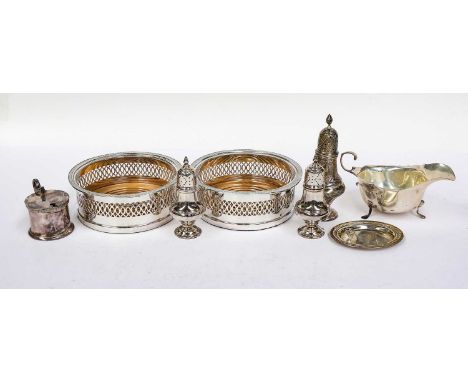 A Collection of Assorted Silver and Silver Plate, the silver including: a three various pepperettes; a pair of serving spoons