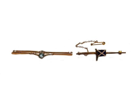 An aquamarine bar brooch, stamped '9CT', length 5.5cm; and a Benzie enamel flag brooch, stamped '9CT', length 4.4cmGross weig