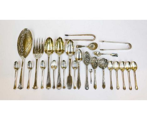 A collection of assorted silver flatware, including: a Fiddle Thread pattern caddy spoon; two pairs of sugar-tongs and other 