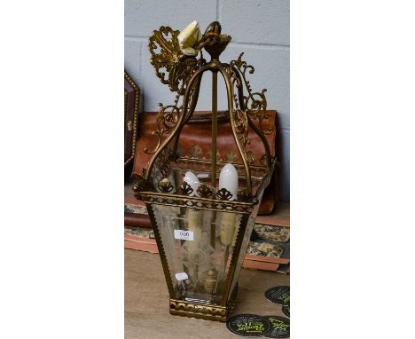 A gilt metal hall lantern of square tapering form, twin light and with etched glass panels, 57cm
