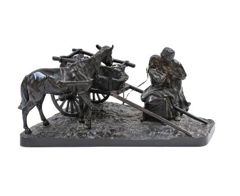 A late 19th / early 20th century patinated bronze figure group, a Russian couple resting by the side of a horse and cart, rai