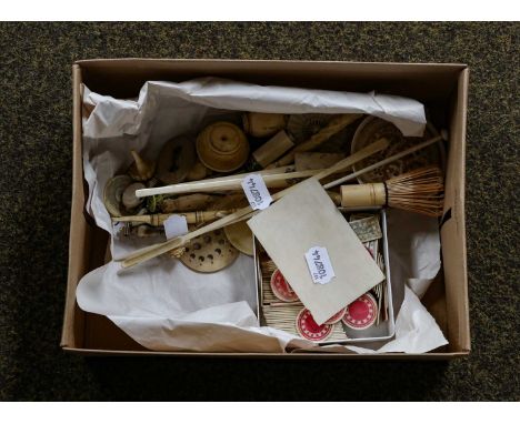 A Collection of Chinese Stained and Natural Ivory Gaming Tokens, 19th century: A Cantonese Ivory Dish, carved and pierced in 