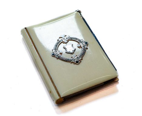 A Silver and Enamel-Mounted Ivory Wallet, First Quarter 20th Century, oblong, the cover applied with an enamelled silver wrea