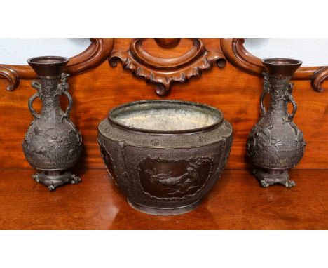 A pair of Japanese Bronze two handled vases and a similar Japanese Bronze Jardiniere, Meiji period (3)