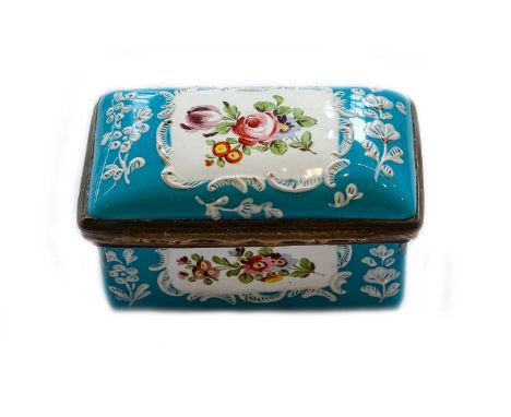 An 18th century rectangular enamel box with hinged cover, painted with raised white flowers on a blue ground and panels of co