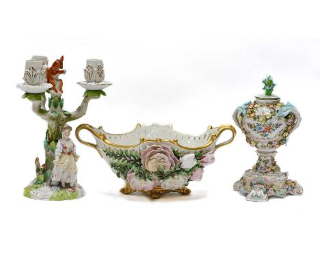 A quantity of 19th century Continental porcelain including a Sitzendorf basket and covered vase, a three light candelabra sur