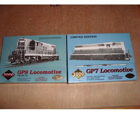 A pair of HO scale American Outline Diesel locomotives by Proto 2000 - VG in G boxes (2)