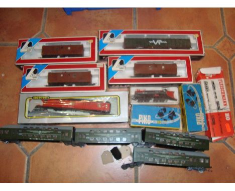 A quantity of HO Gauge rolling stock, mostly boxed, by Lima, Piko etc - G-VG in P-G boxes (where boxed) (10)